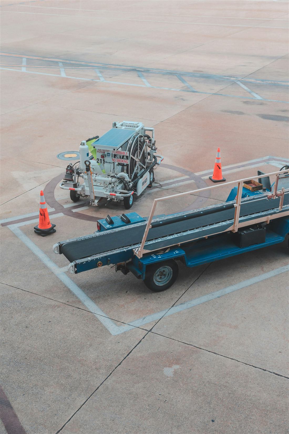 Ground support equipment staged on an airport tarmac.